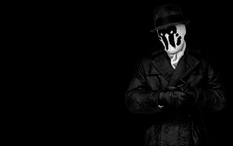 masked figure in trench coat