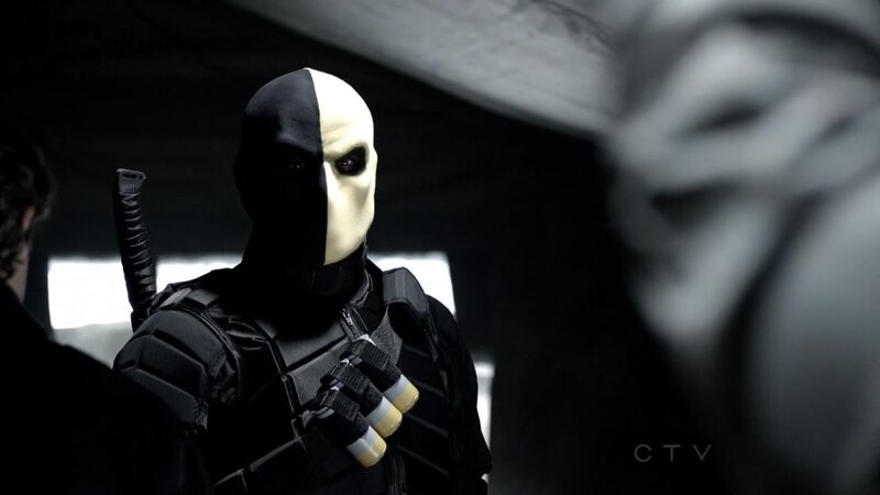 Masked Figure with Weapon — Black, Dramatic