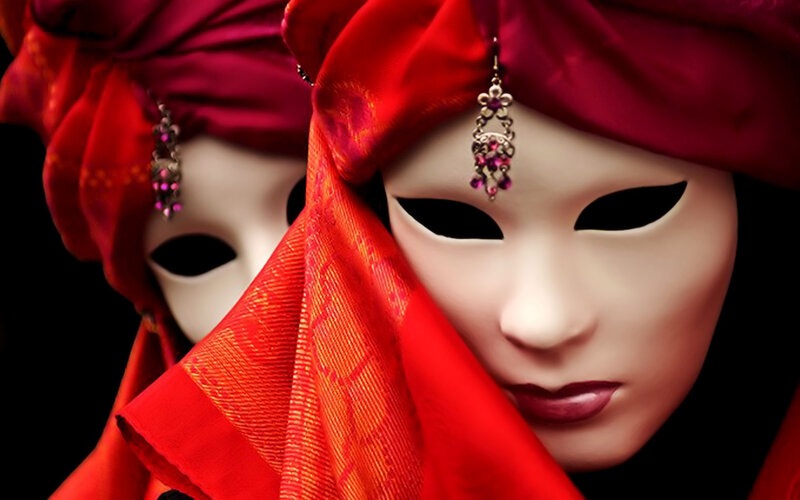 masked figures in red