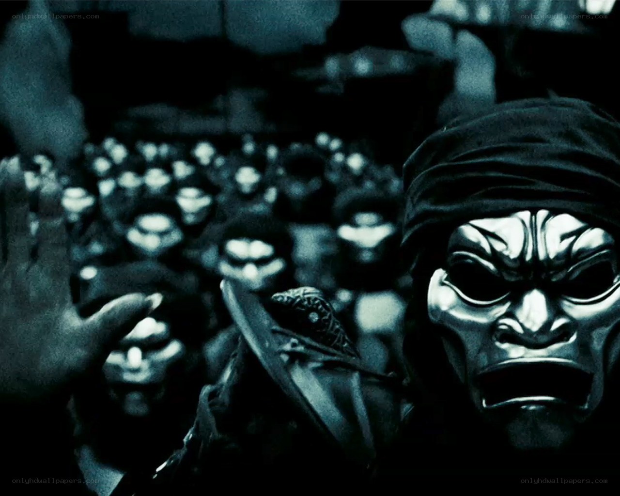 masked warriors in dark assembly