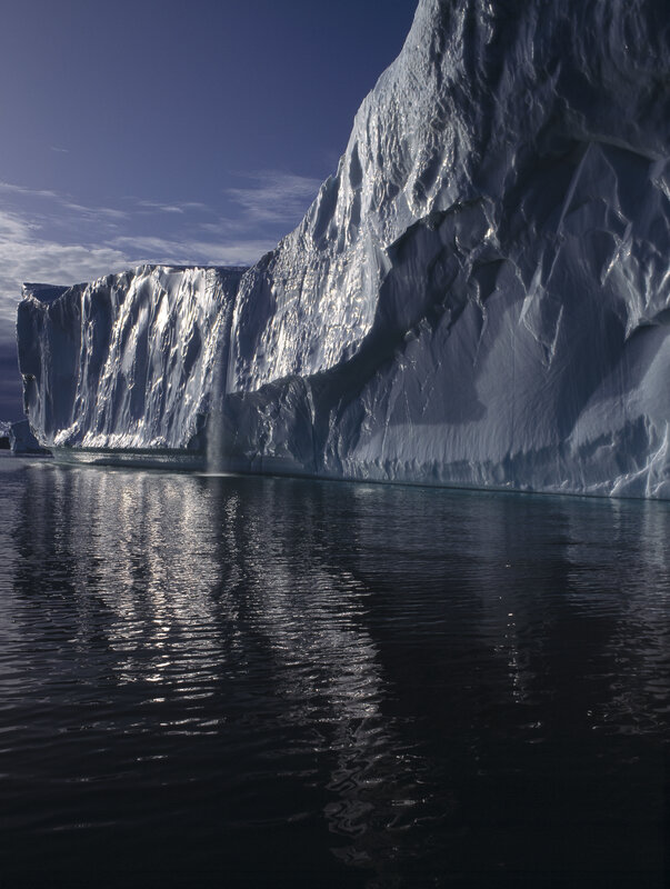 Massive iceberg in calm waters