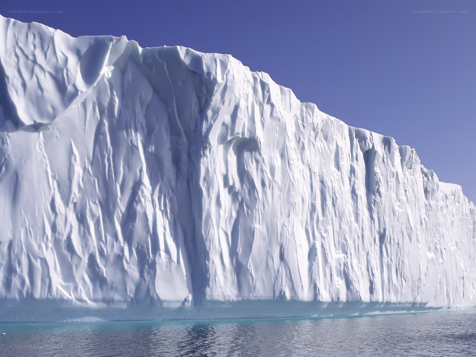 Massive iceberg in clear water