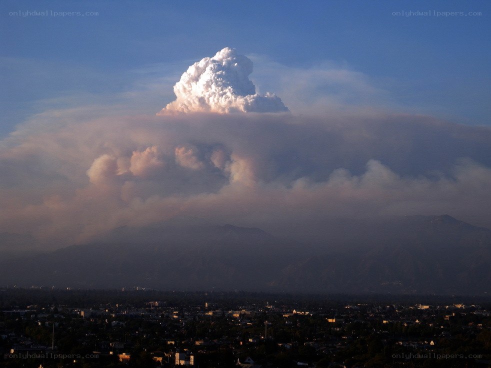 Massive smoke plume over city