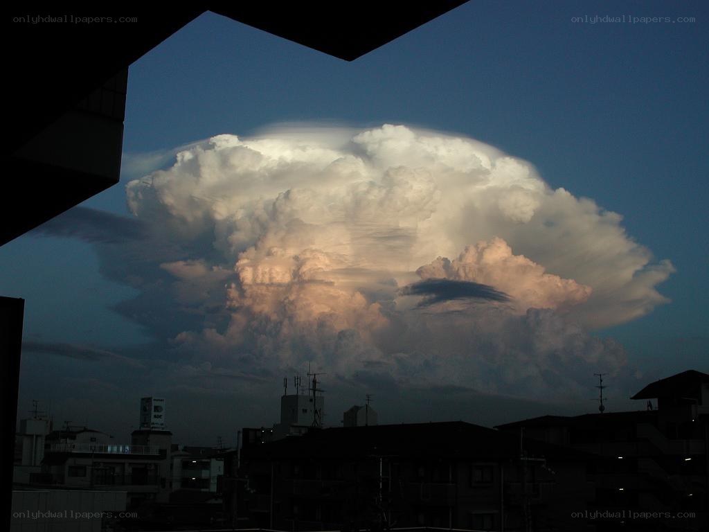 Massive storm cloud over city