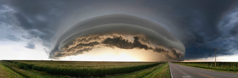 Massive storm cloud over farmland