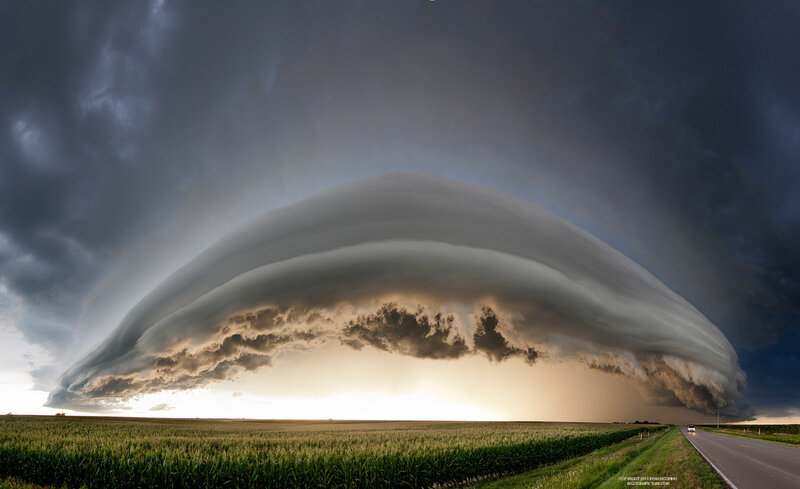 Massive storm cloud over farmland