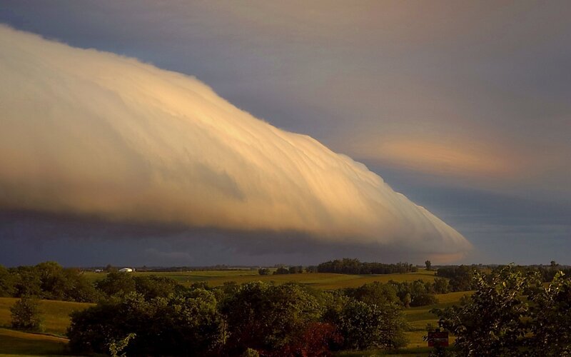 Massive storm cloud over fields