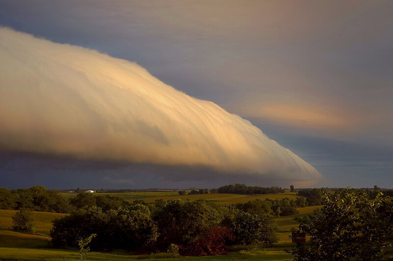 Massive storm cloud over fields