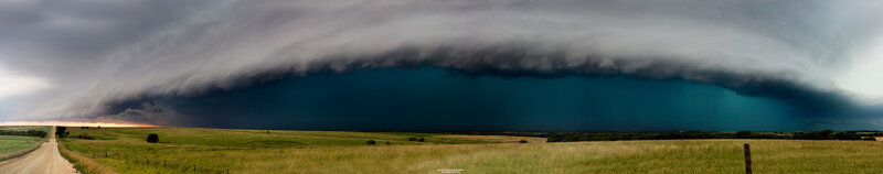 Massive storm cloud over prairie