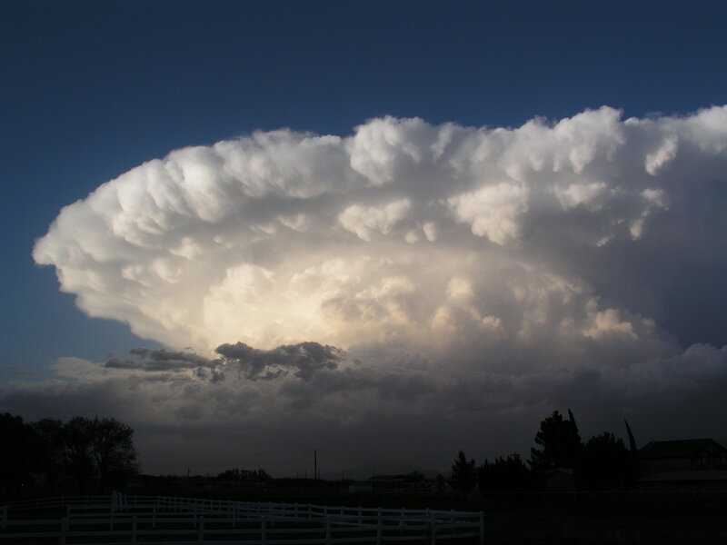 Massive storm cloud over rural area