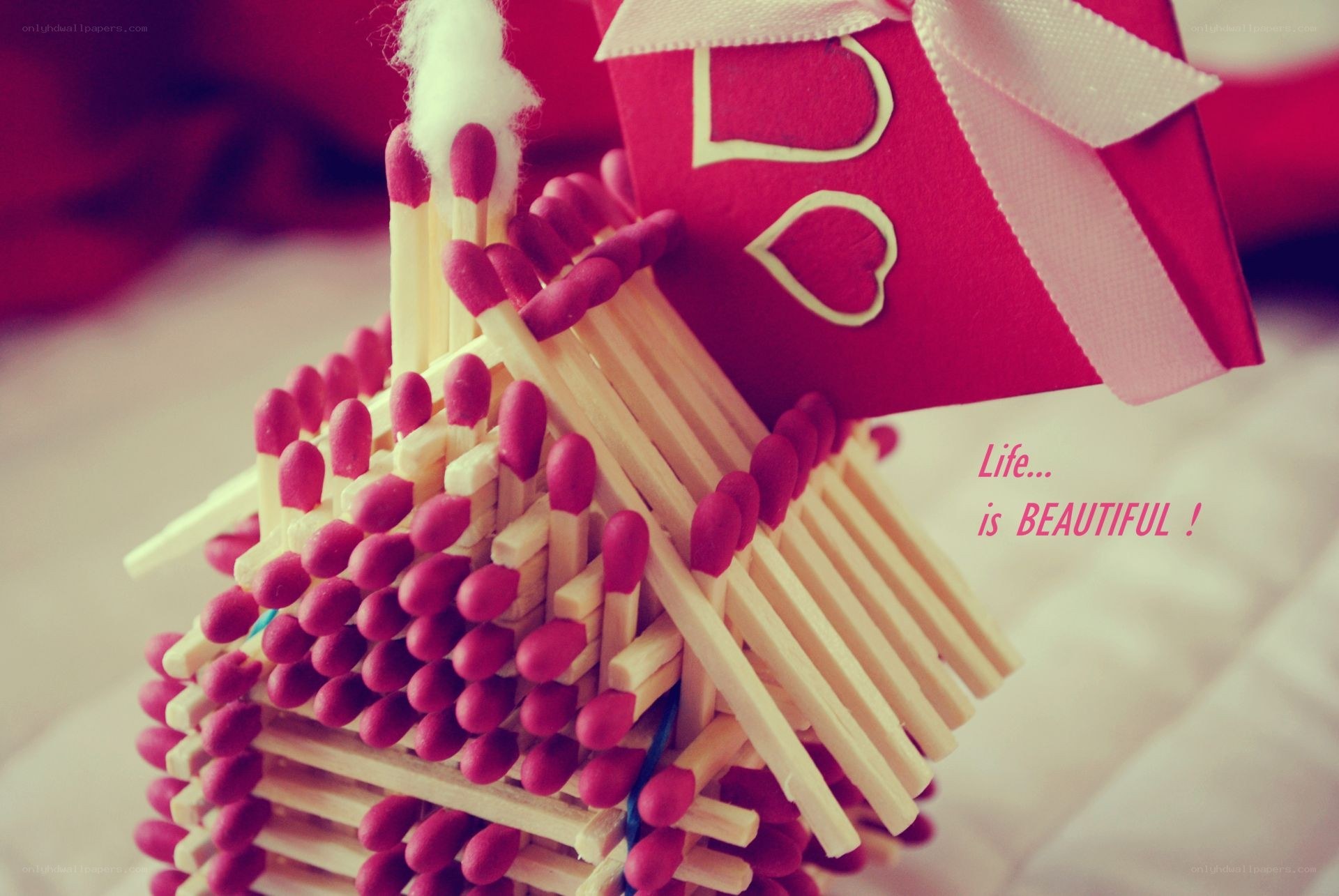 matchstick house with gift box