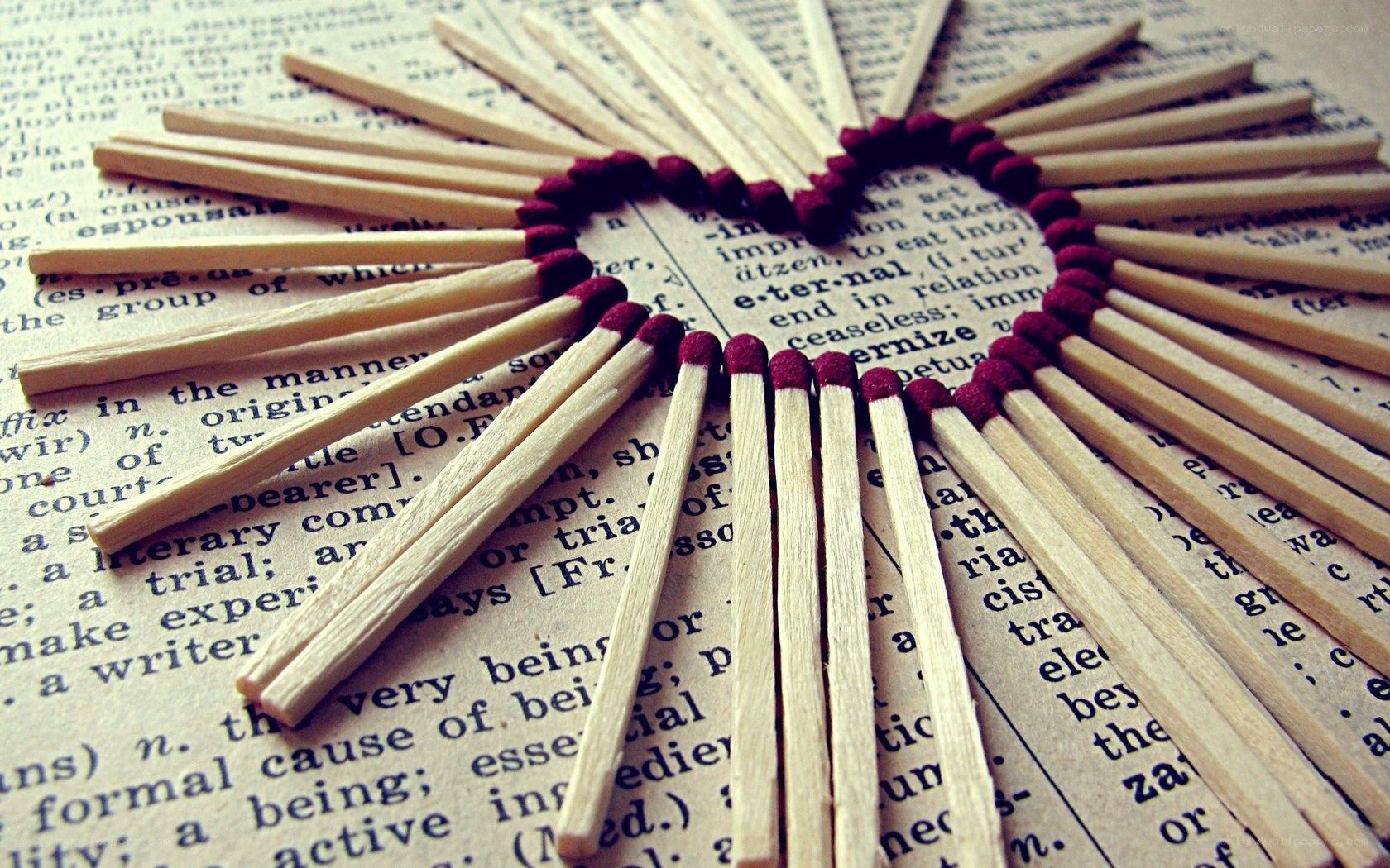 matchsticks arranged in a heart shape