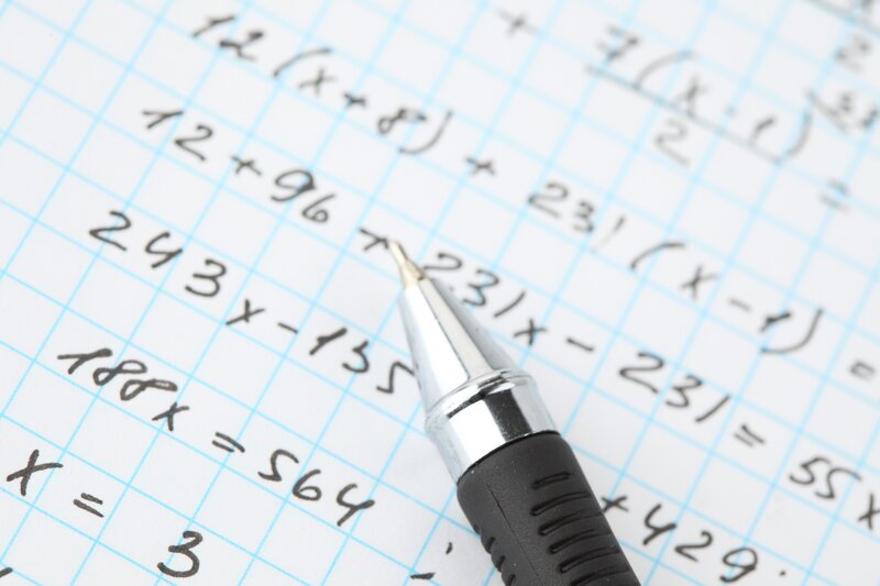 Math Equations on Paper — White