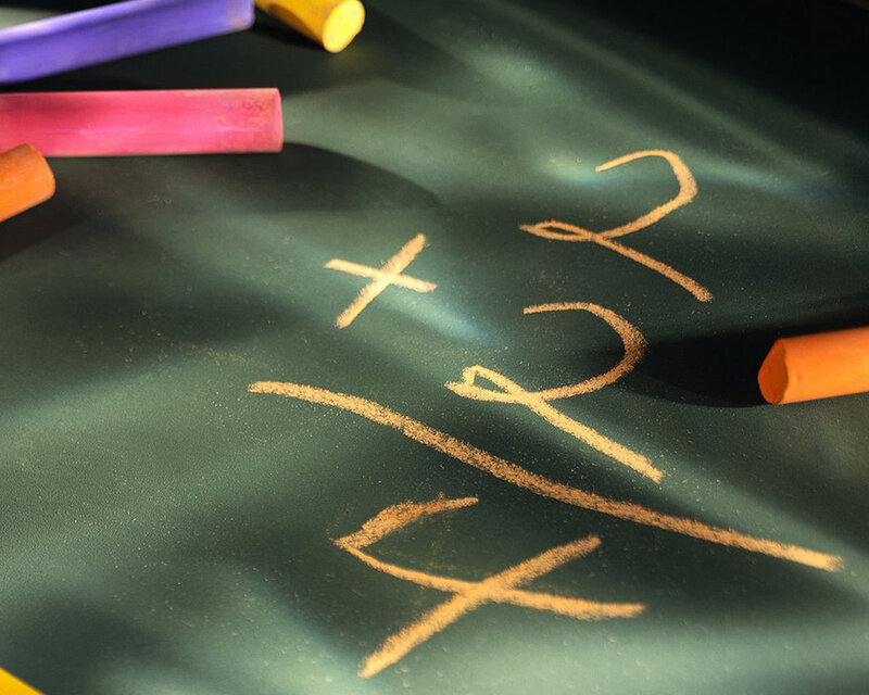mathematical equation on chalkboard