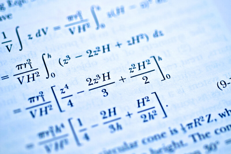mathematical equations on paper