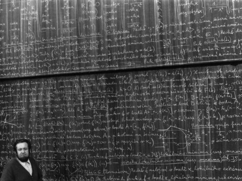 Mathematician at a chalkboard