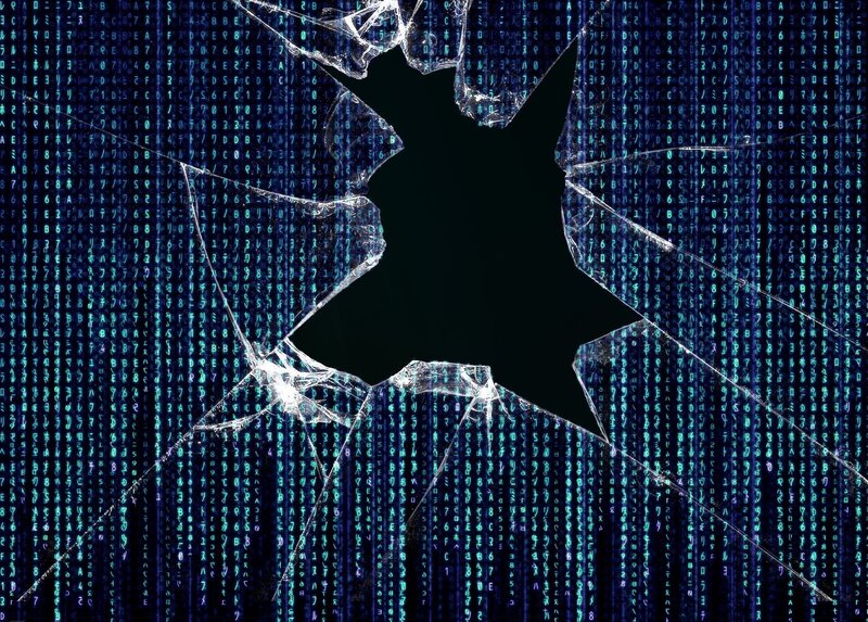 Matrix code through broken glass