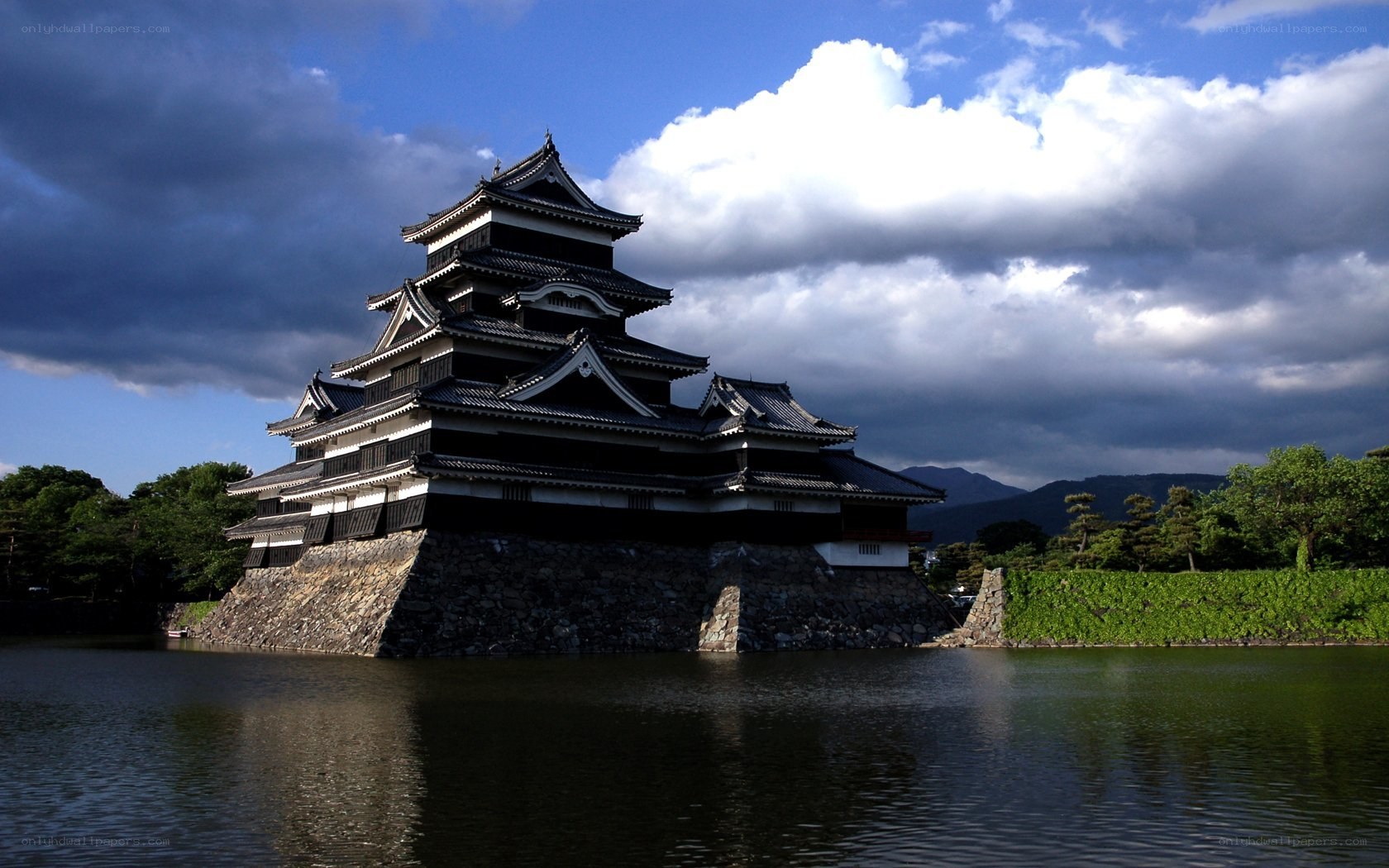 Matsumoto Castle under dramatic sky