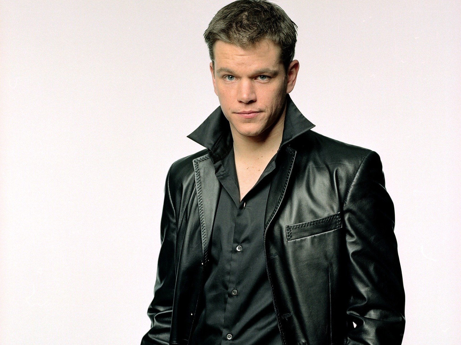 Matt Damon in black leather jacket