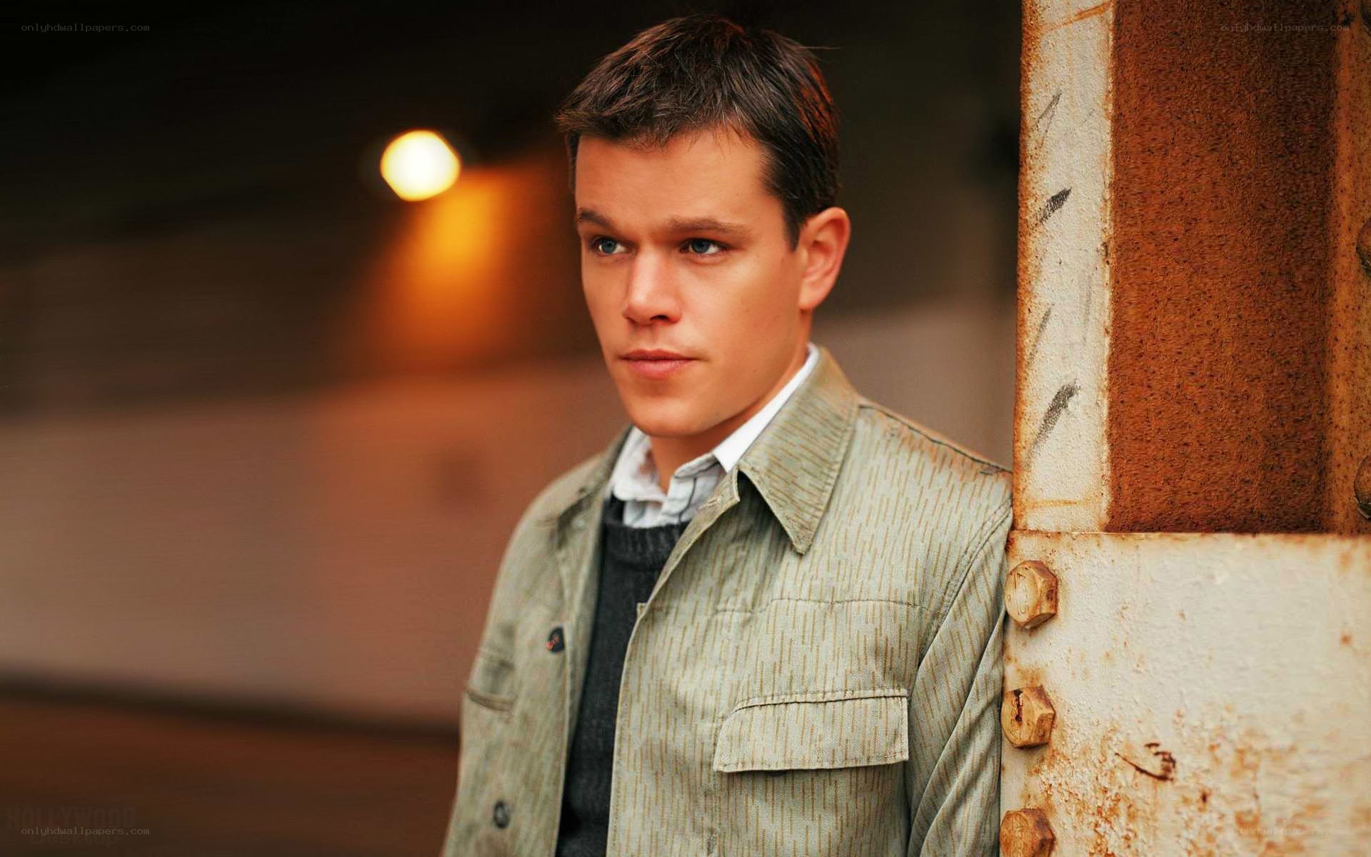 Matt Damon leaning against a wall