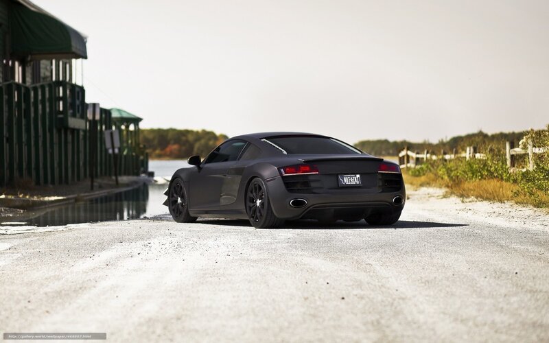 Matte black Audi R8 by the water