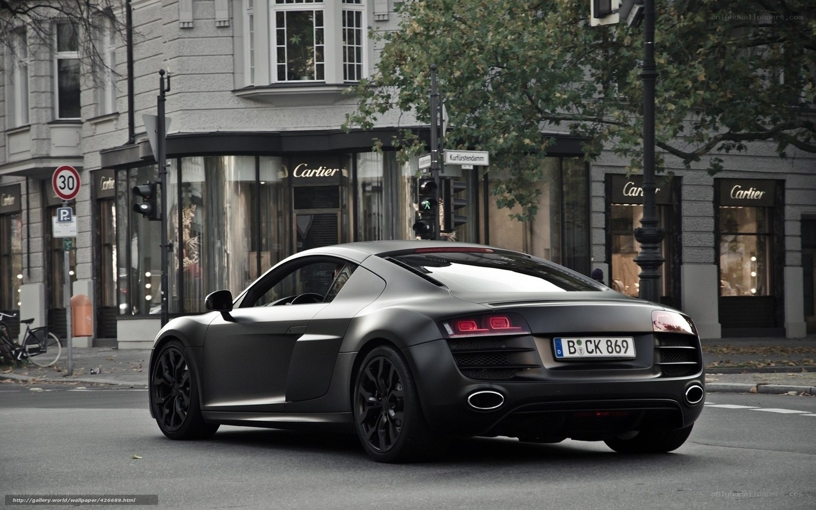 Matte black Audi R8 on city street