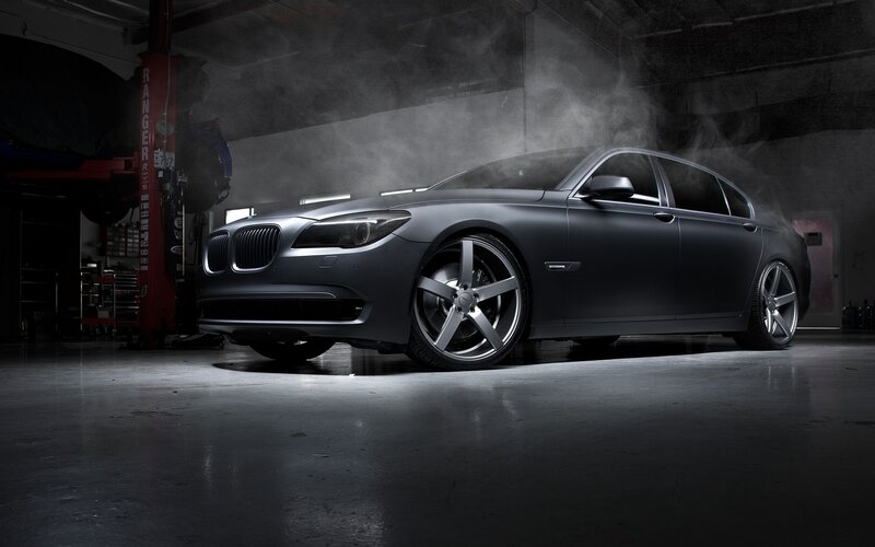 matte black bmw in garage