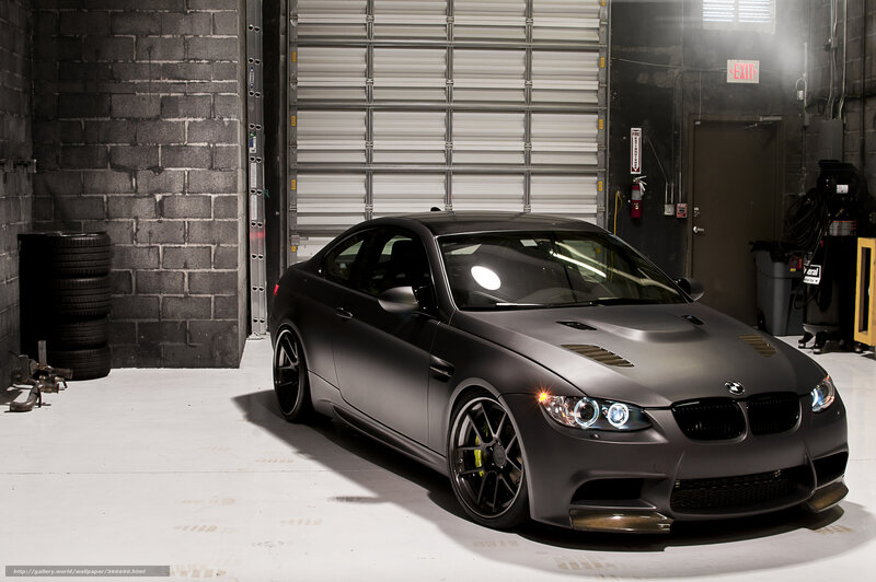 Matte black BMW in garage