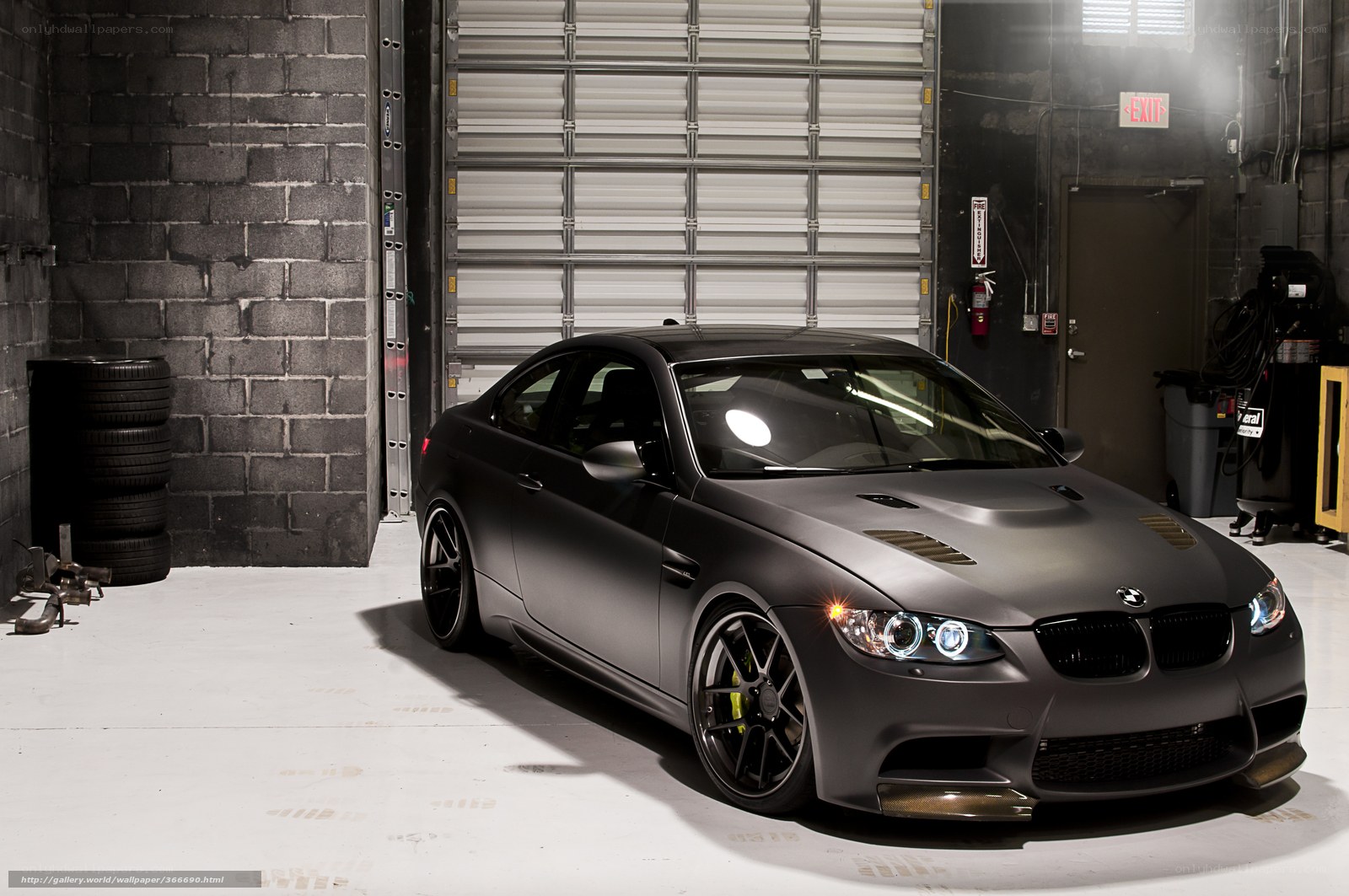 Matte black BMW in garage