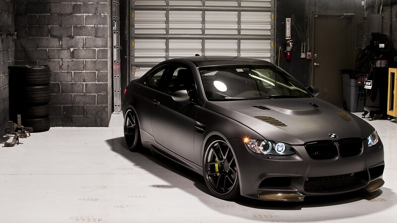 matte black bmw m3 in garage
