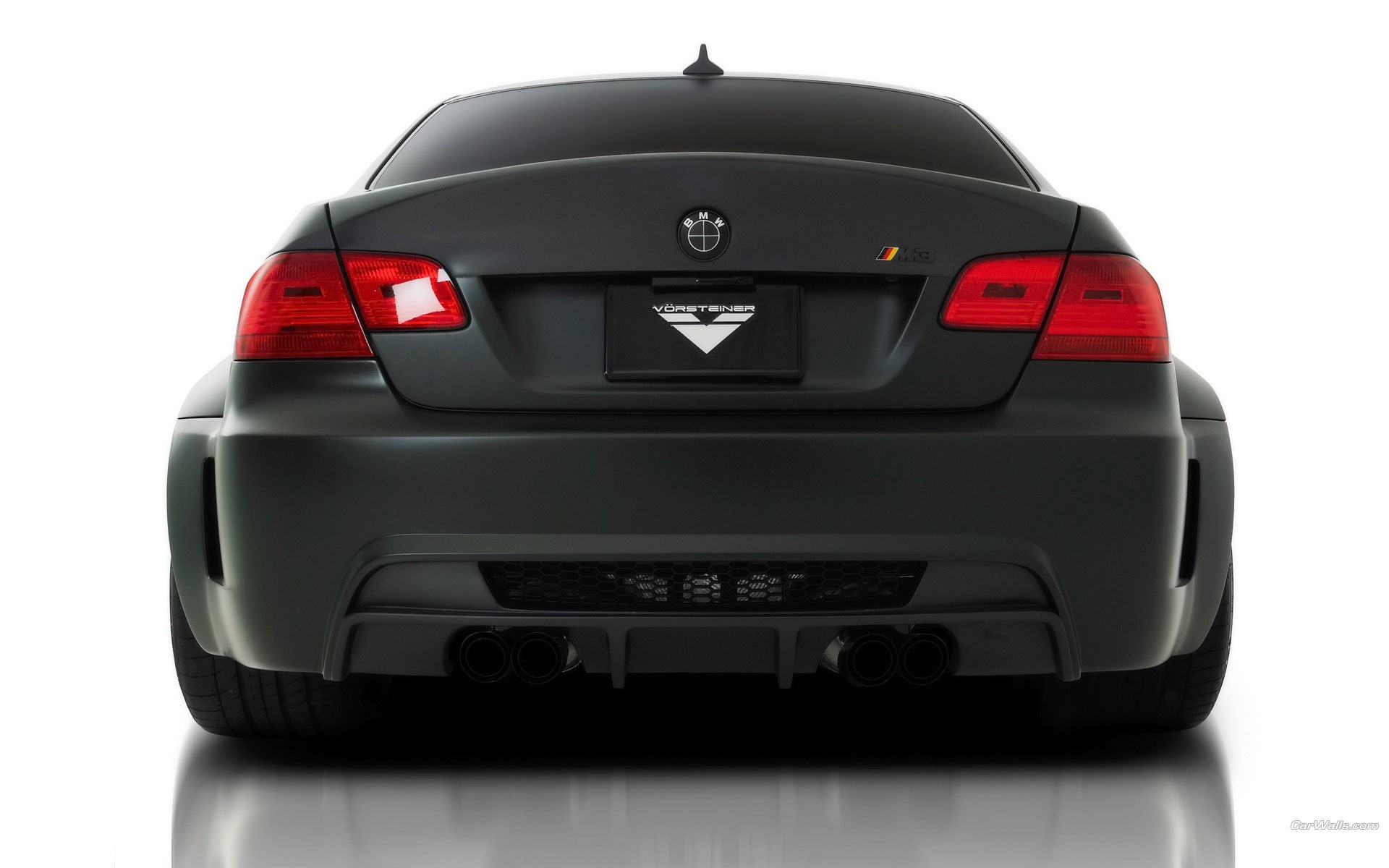 matte black BMW M3 rear view