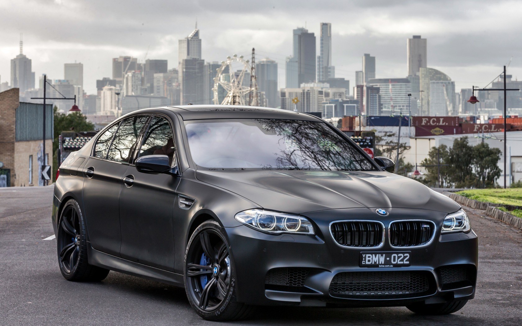Matte black BMW M5 in city