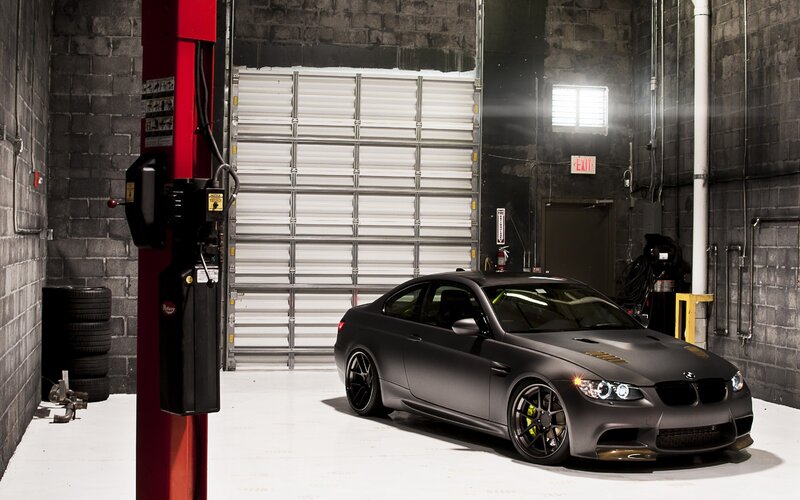 Matte Black Car in Garage
