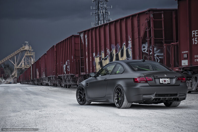 matte black car near train