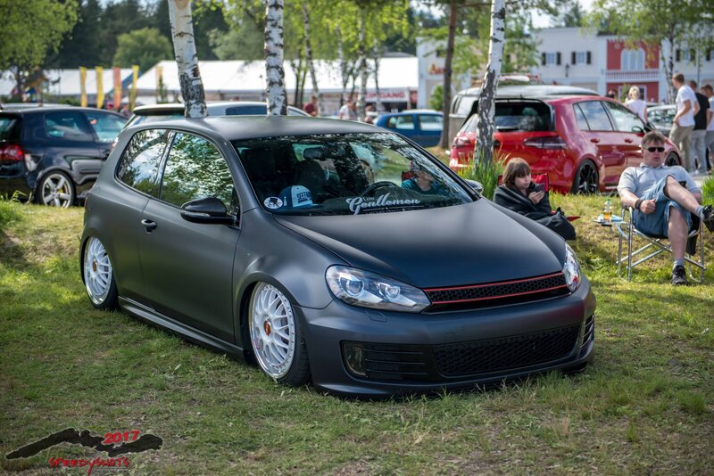 Matte Black Car on Grass