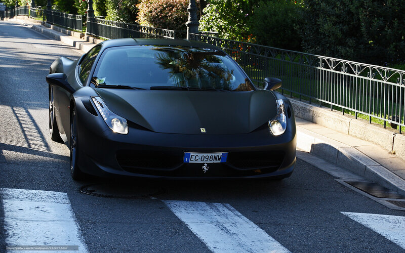 Matte black Ferrari on a city street