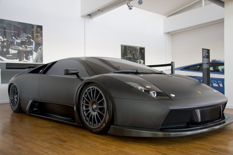 Matte black Lamborghini in showroom