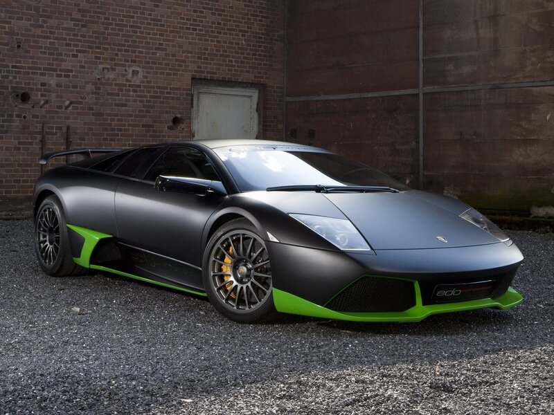 Matte black Lamborghini with green accents