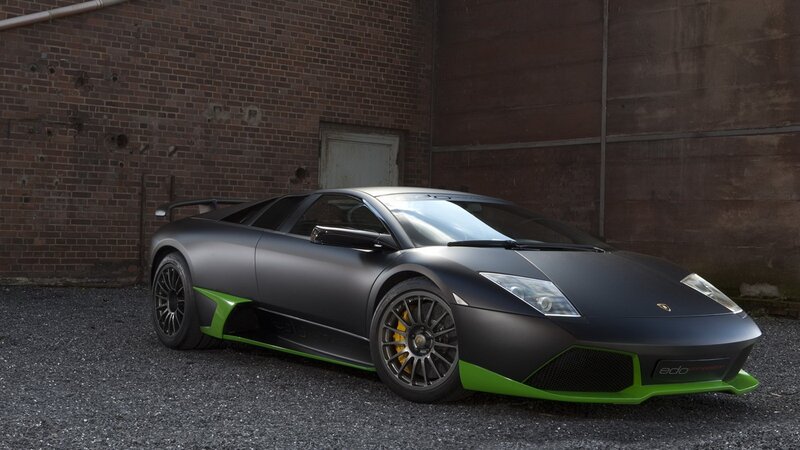 Matte black Lamborghini with green accents