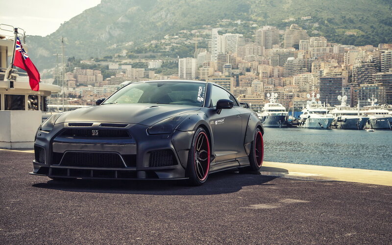 Matte black Nissan GT-R by the harbor