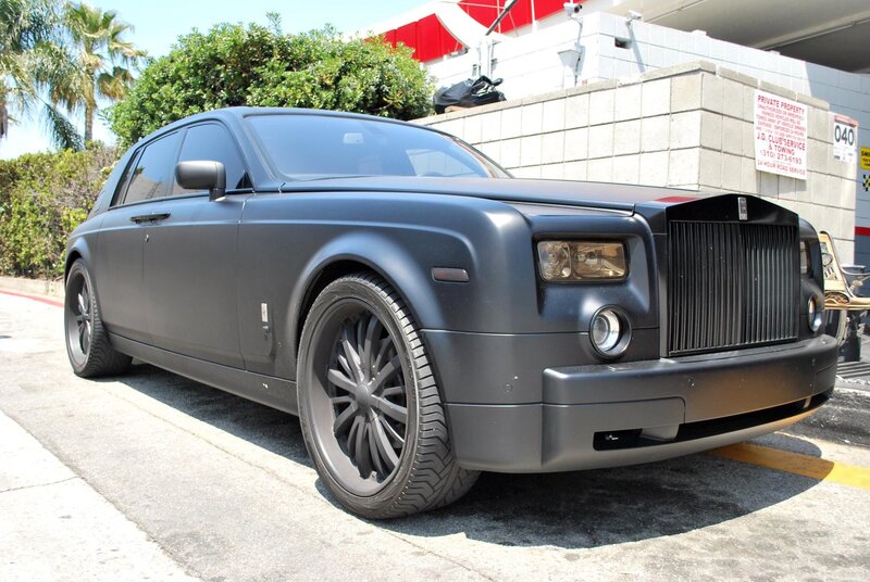Matte black Rolls-Royce parked