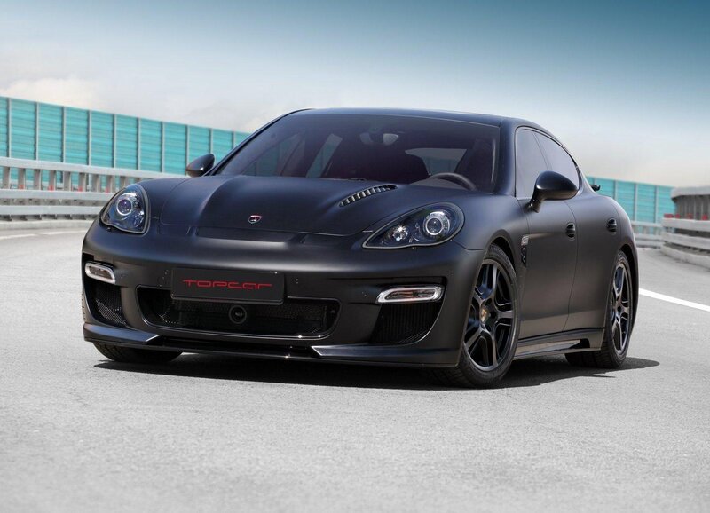 Matte black sports car on track