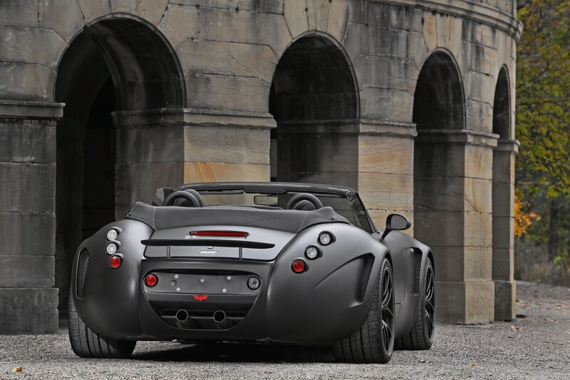 Matte black sports car rear view