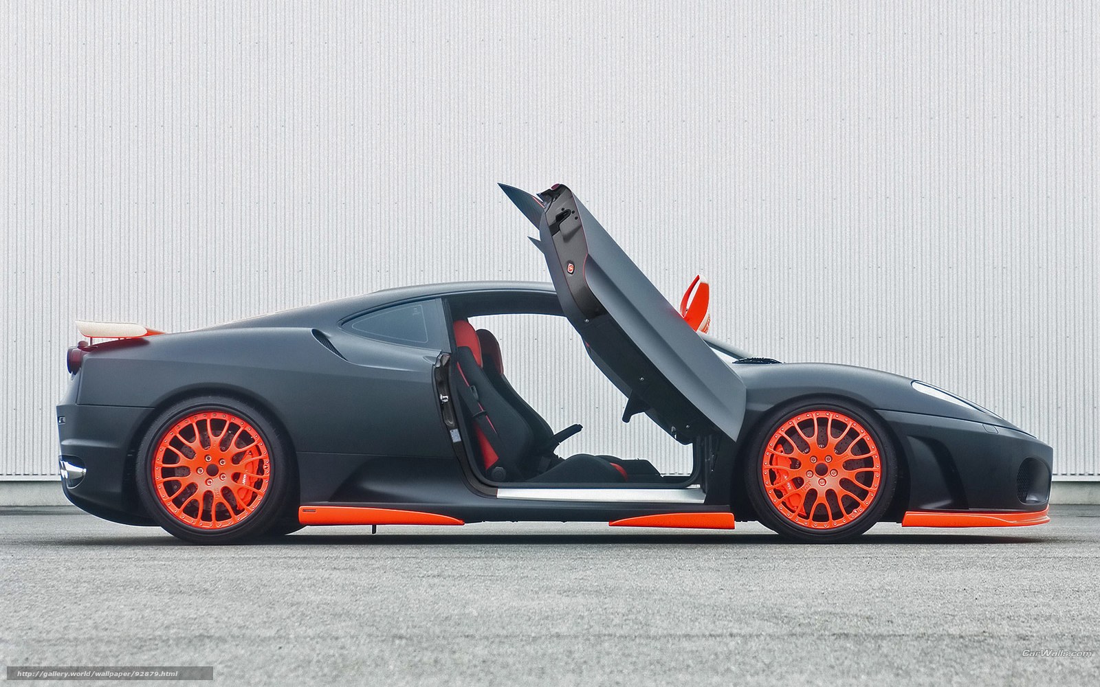 Matte black sports car with orange accents
