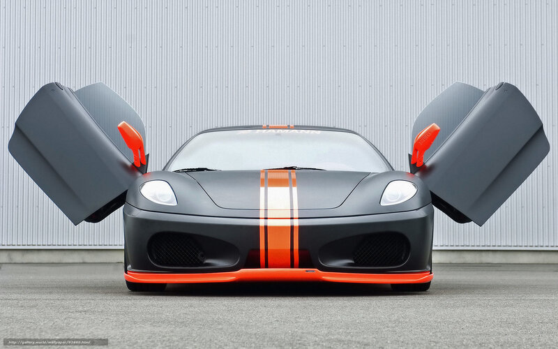 Matte black sports car with orange accents