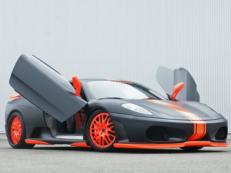 Matte black sports car with orange accents