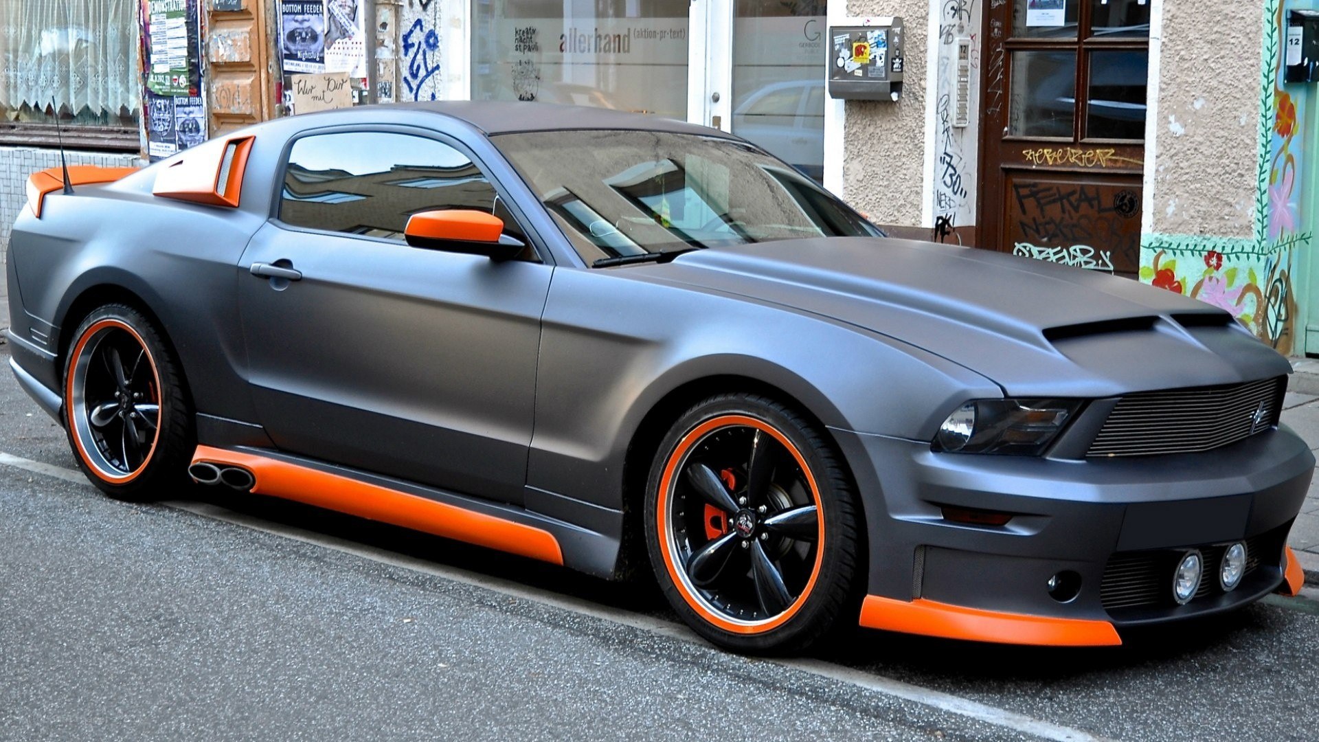 matte gray and orange Ford Mustang