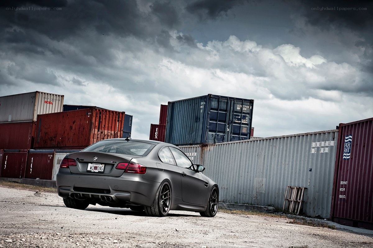 Matte gray BMW in shipping yard