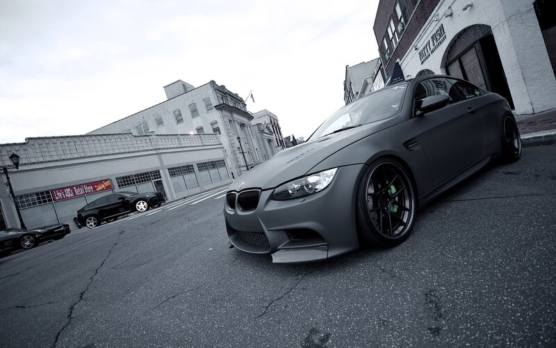 matte gray bmw m3 on city street