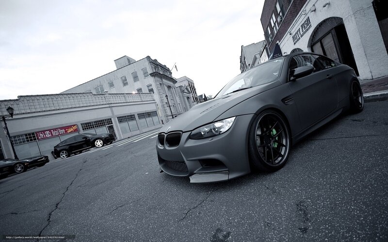 matte gray bmw m3 on city street